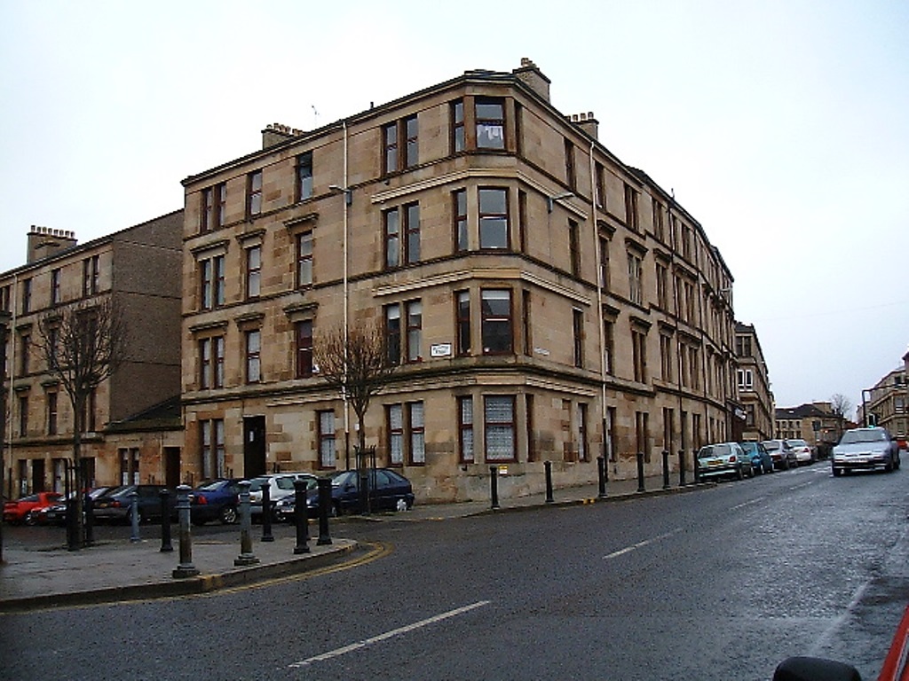 A 4-storey corner building on a main road